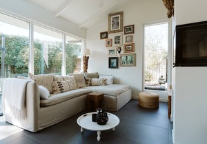 Spacious beach style holiday home with large garden and sauna.