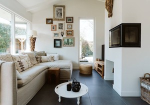 Spacious beach style holiday home with large garden and sauna.