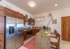 Spacious beachfront condo with AC, WiFi, swimming pool!