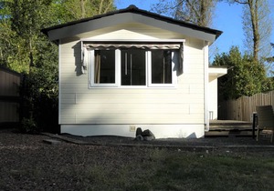 Spacious chalet for rent with nice view over the grounds against forest