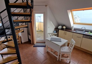 Strandperle 16 - Cozy penthouse with roof terrace and elevator