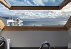 Strandperle 16 - Cozy penthouse with roof terrace and elevator