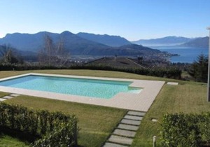 Stylishly furnished apartment in a residence with pool and dream view