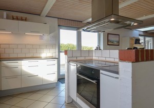 The beautiful nature area of Lodbjerg Hede with its extensive heath landscape and small woods is loc