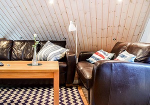 The cottage invites you to a nice vacation with an open plan solution and high ceiling in the living