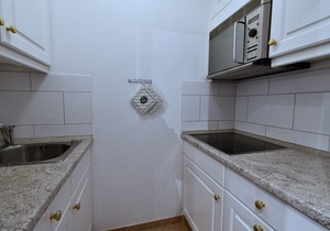 The cozy 3-room apartment has a fantastic panoramic lake view from the balcony.