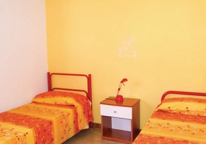This apartment is located in a residential complex in front of the tourist port of Castelsardo, in S