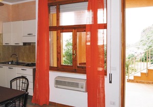 This apartment is located in a residential complex in front of the tourist port of Castelsardo, in S