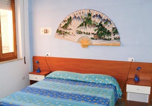 This apartment is located in a residential complex in front of the tourist port of Castelsardo, in S