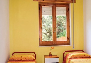 This apartment is located in a residential complex in front of the tourist port of Castelsardo, in S