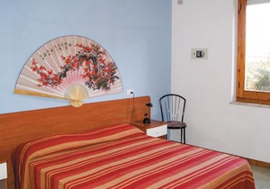 This apartment is located in a residential complex in front of the tourist port of Castelsardo, in S