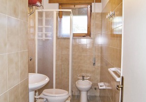 This apartment is located in a residential complex in front of the tourist port of Castelsardo, in S