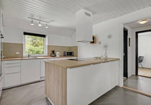 This large vacation home is located in a quiet area and can accommodate no less than 14 people.