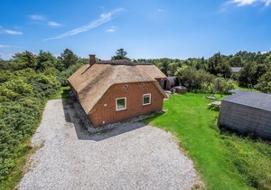 This large vacation home is located in a quiet area and can accommodate no less than 14 people.