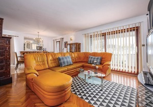 This Mediterranean vacation home with pool and beautifully landscaped garden is located in a settlem