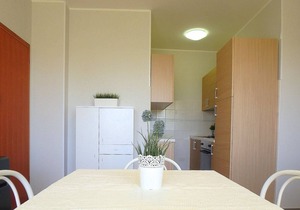three-room apartment in a beachfront condo with a view of the pedestrian walkway