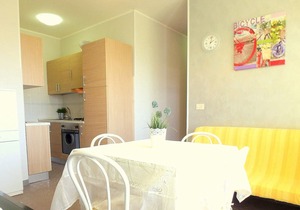 three-room apartment in a beachfront condo with a view of the pedestrian walkway