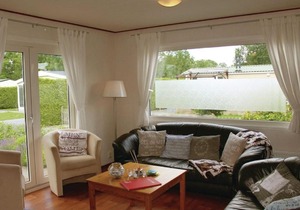 Tidy chalet with a microwave, near the Wadden Sea