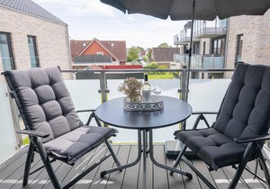 Vacation apartment Ahoi with balcony in the sun garden in Kellenhusen