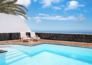 Vacation Apartment “La Vega de Lanzarote 4” with Sea View, Pool & Wi-Fi