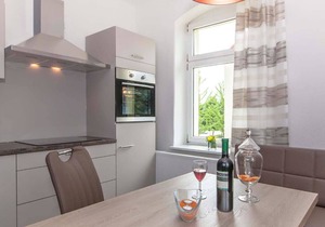 Vacation apartment with cozy garden corner