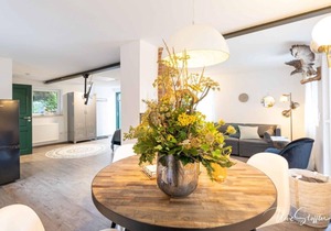 Vacation home Schrat with fireplace in an idyllic location on the edge of the forest below a wellness hotel.