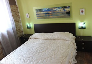 Viilla surrounded by greenery 1 km from the sea and adjacent to the town.