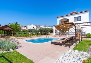 Villa with private pool and large balcony with sea view, ideal for families.