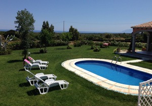 Villa with private pool, large lawn, all with sea view.