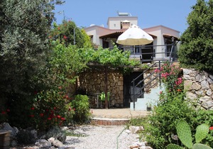 Villa with secluded private pool & garden and sea & mountain views.