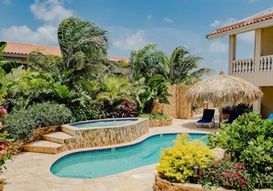 Wonderful modern 2-bedroom apartment with tropical garden, pool and whirlpool