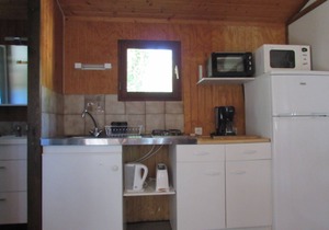 Wooden chalets in gite village with terrace, barbecue, swimming pool and air conditioning