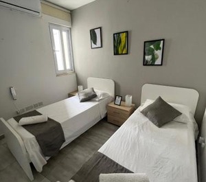 Habitación Camas Sencillas Baño Compartido 