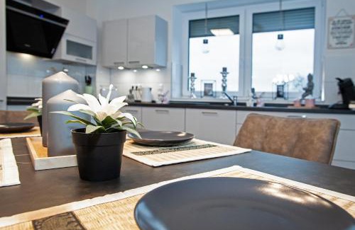 Grasberg Apartment | Über den Dächern von Grasbergs City