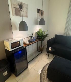 Jizan Apartment | استديو بسرير ماستر بالاضافة لغرفة بسريرين