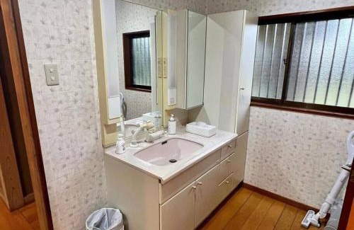 Sanmu House | さくらの宿Traditional Japanese house with cherry blossoms