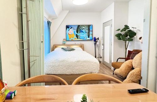 Taito Apartment | 元桜2号上野浅草高級民泊最大8人駅6分高級ブランドベッド家庭映画館無料自転車