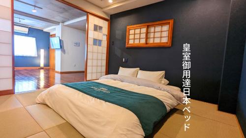 Kumoji Apartment | 琉球モダン宿りゅうだん