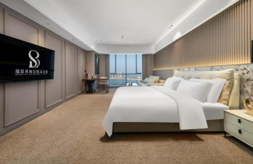 Chikan District Hotel | 瑞思贝海景精品公寓