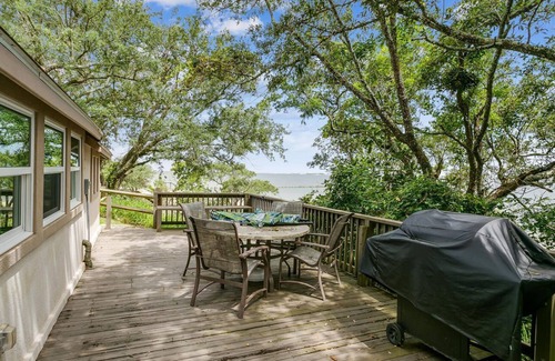 Navarre Cottage | 1 acre Historic Waterfront Cottage, private beach, pet friendly, 3 miles to Gulf