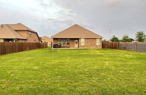 Krum House | 1 bedroom with queen size bed and shared bathroom one guest per room