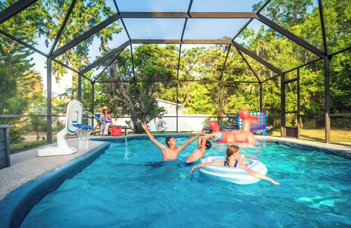 Palm Coast House | 1 Min Private Beach & River Access w Movie Room, Heated Pool, Kayaks & Game Room