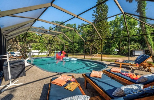 Palm Coast House | 1 Min Private Beach & River Access w Movie Room, Heated Pool, Kayaks & Game Room