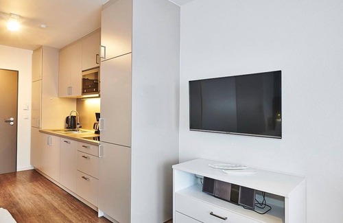 Bensersiel Apartment | 1-room apartment near the North Sea with balcony incl. use of swimming pool & sauna -