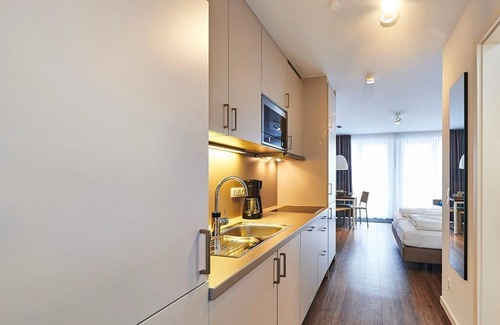 Bensersiel Apartment | 1-room apartment near the North Sea with balcony incl. use of swimming pool & sauna -