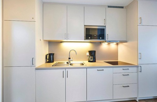 Bensersiel Apartment | 1-room apartment near the North Sea with balcony incl. use of swimming pool & sauna -