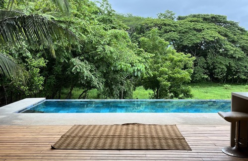 Paraiso House | 10 min to the beach luxury home with beautiful nature around the property .