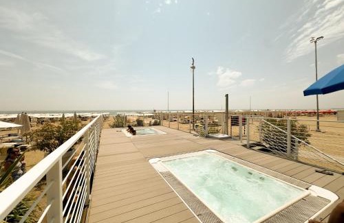 Lignano Sabbiadoro Apartment | 100 m from the beach with CABANA and JACUZZI included