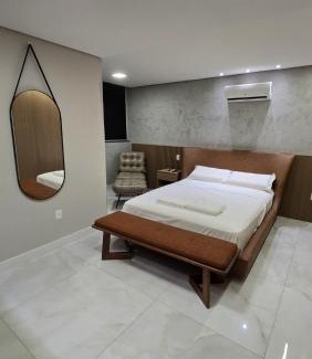 Castelo Apartment | 101 - Área Privativa de Luxo ar condicionado e churrasqueira