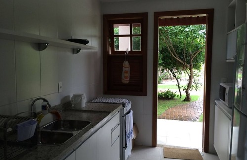 Praia do Forte Apartment | 110 m2 apartment with 2 suites overlooking environmental protection area